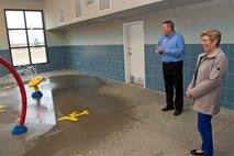 (From left) Michael Lahr, Minot Air Force Base Community Homes manager, shows Ellyn Dunford, spouse to the Chairman Joint Chiefs of Staff, a water playground in the Homes Neighborhood Center at Minot AFB, N.D., Nov. 2, 2016. Dunford toured Minot AFB Homes Neighborhood Center and was briefed on the center’s demonstrations and programs. (U.S. Air Force photo/Airman 1st Class Jonathan McElderry)