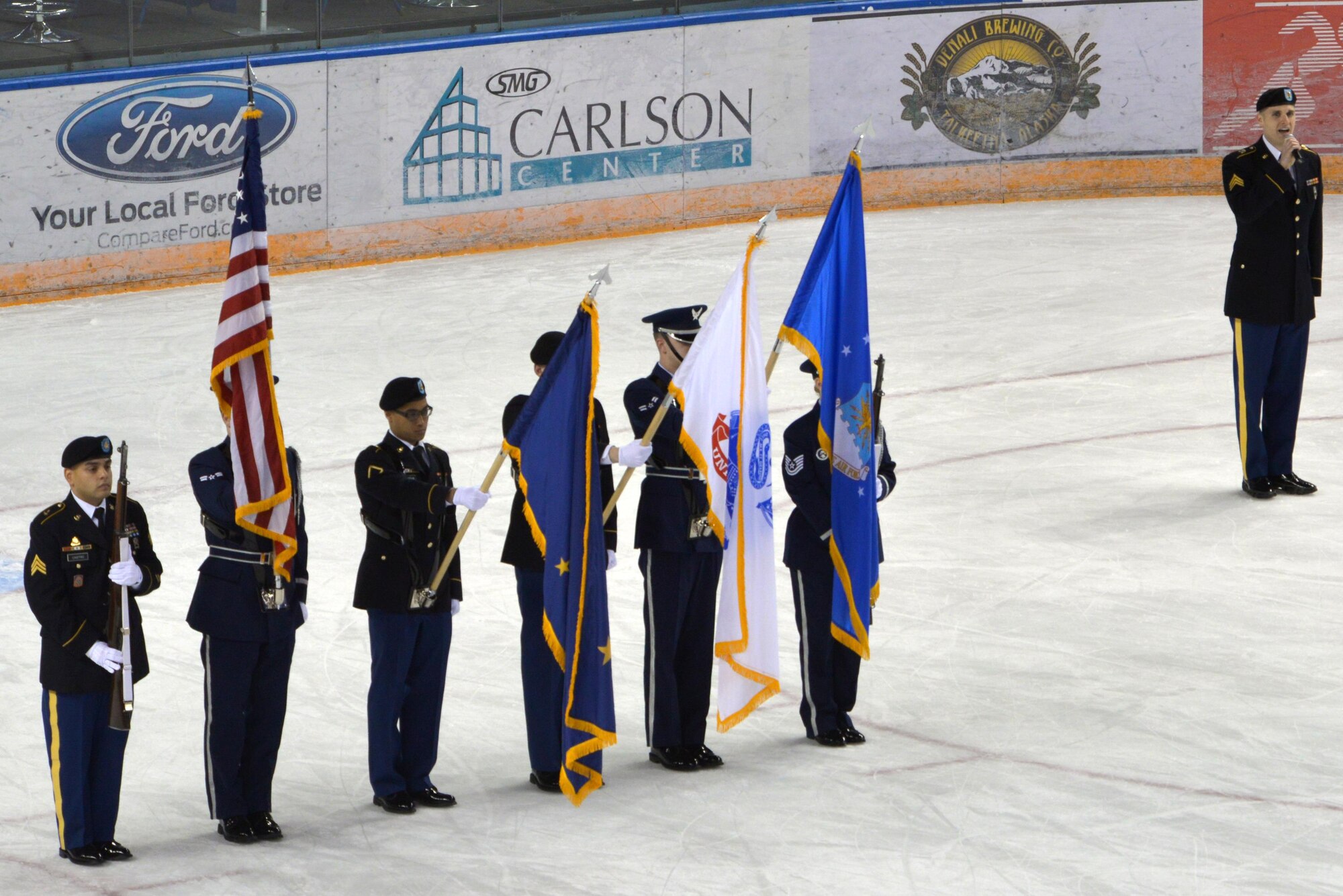 Members of the Fort Wainwright and Eielson Air Force Base Honor Guard present the Colors at the Army versus Air Force Hockey game Nov. 5, 2016, at the Carlson Center in Fairbanks, Alaska. The Army versus Air Force Hockey game has been a tradition for 22 years. (U.S. Air Force photo by Airman Eric M. Fisher)
