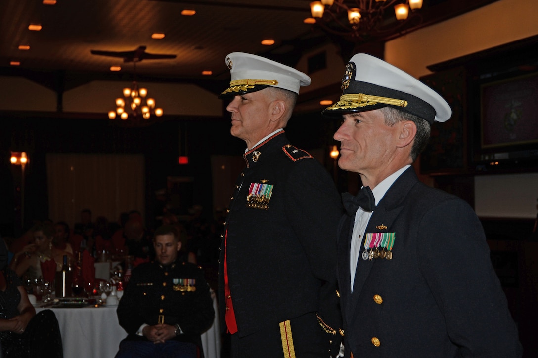 Brig. Gen. John Jansen, Commanding General, 3d Marine Expeditionary Brigade (MEB), and Rear. Adm. Marc H. Dalton, Commander, Amphibious Force 7th Fleet, look on during a ceremony in commemoration of the Marine Corps birthday during the 3d MEB Marine Corps ball. The event celebrated the Marine Corps’ 241st birthday with a ceremony and dinner. (U.S. Navy photo by Petty Officer 2nd Class Sarah Villegas)