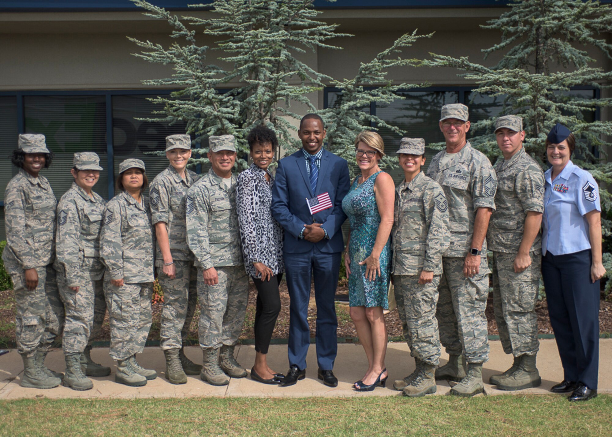 Airman 1st Class Joseph Mwangi, 137th Special Operations Force Support Squadron, became a U.S. citizen, Sept. 13, 2016, in Oklahoma City. His fellow 137th Special Operations Wing Airmen were present at the ceremony to show their support for his once in a lifetime accomplishment. (U.S. Air National Guard photo by Senior Airman Kasey Phipps)