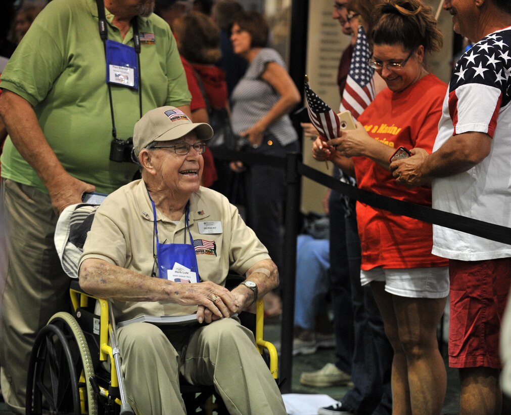 A veteran smiles as he is greeted by community members waiting to thank him for his service at the St. Pete-Clearwater International Airport Nov. 1, 2016. Many community members came out to greet and honor veterans as they returned home from their Honor Flight to Washington D.C. 