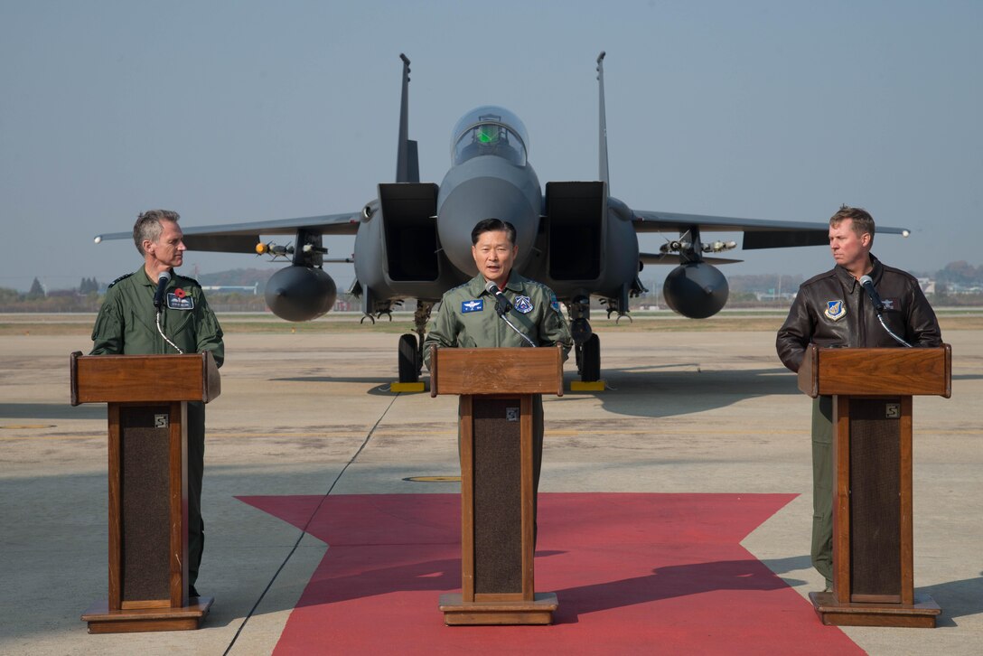 United Kingdom Air Chief Marshal Sir Stephen Hillier, Royal Air Force chief of air staff, Lt. Gen. Won, In-Choul, Republic of Korea Air Force Operations Command commander, and Lt. Gen Thomas W. Bergeson, 7th Air Force commander, participate in a media event for Invincible Shield, an interoperability exchange, at Osan Air Base, ROK, Nov. 8, 2016. The RAF, U.S. and ROK air forces participated in Invincible Shield, which marked the first time the RAF has fielded aircraft on the Korean Peninsula since the Korean War. (U.S. Air Force photo by Senior Airman Dillian Bamman)