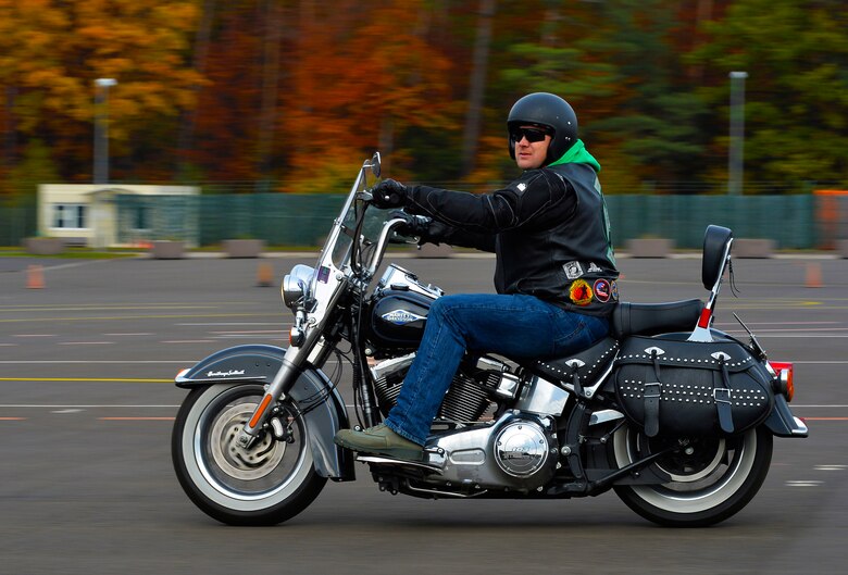 Tech. Sgt. Jeremy Hunt, 721st Aircraft Maintenance Squadron flightline expediter and Green Knights Military Motorcycle Club Chapter 29 president, rides his motorcycle during a safety rodeo at Kapaun Air Station, Germany, Nov. 4, 2016. RiderCoaches from the Kaiserslautern Military Community teamed up with German police to teach KMC motorcyclists how to be better and safer riders. (U.S. Air Force photo by Airman 1st Class Joshua Magbanua)