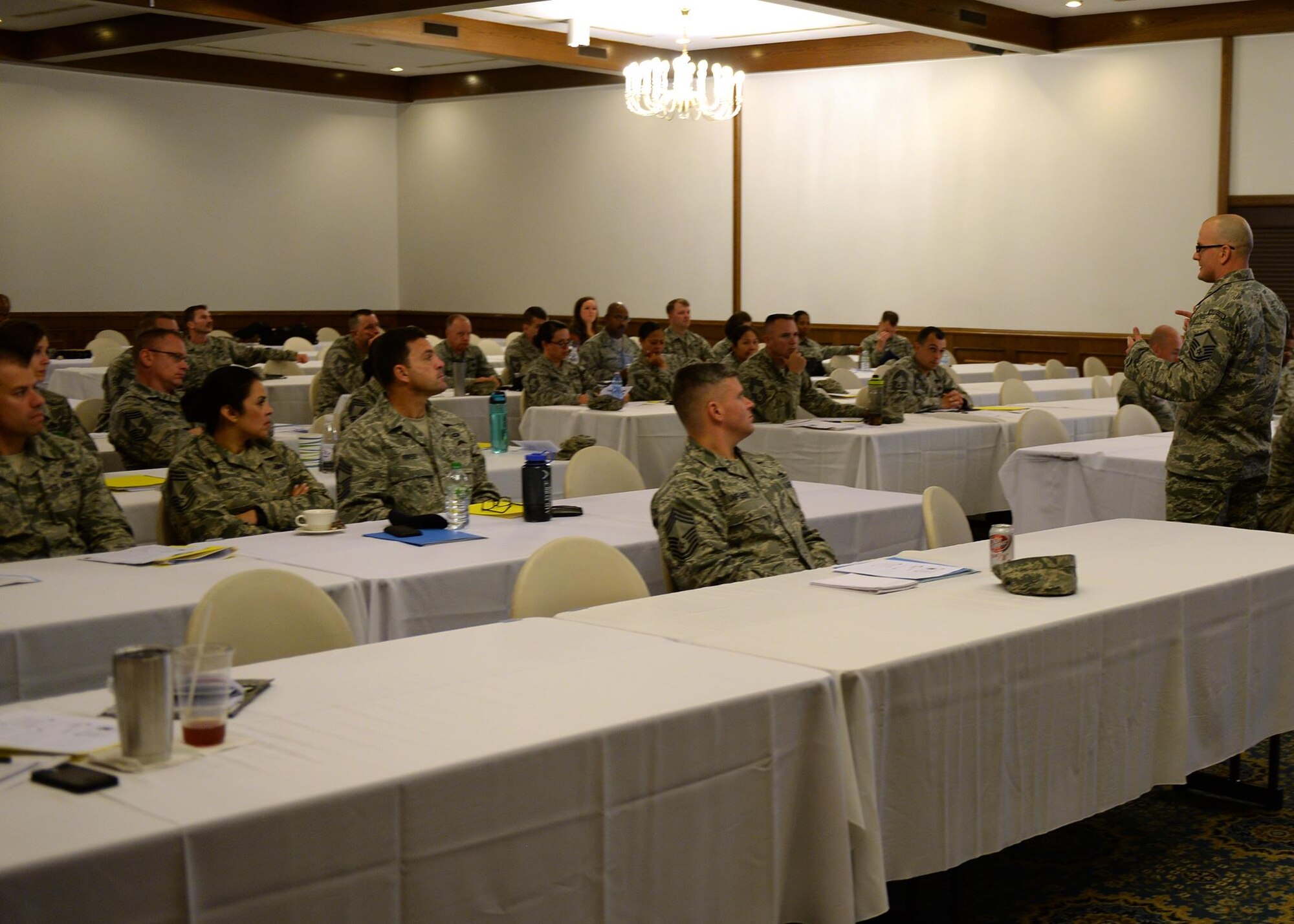Master Sgt. Timothy Herrman, United States Air Forces in Europe Air Forces in Africa unit deployment cell superintendent, speaks to attendees of the Chiefs’ Business Symposium at Ramstein Air Base, Germany, Nov. 2, 2016. Herrman facilitated discussions about thought processes and connecting with Airmen. (U.S. Air Force photo by Senior Airman Jimmie D. Pike)