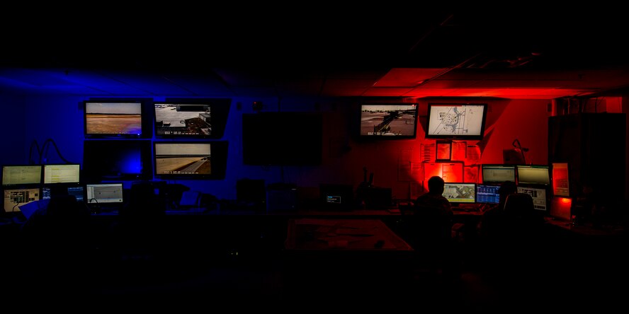 Base Defense Operations Center controllers from the 23d Security Forces Squadron and Emergency Control Center dispatchers from the 23d Civil Engineer Squadron man their terminals, Nov. 1, 2016, at Moody Air Force Base, Ga. These Airmen recieve alerts and phone calls, then coordinate a timely response. (U.S. Air Force photo by Airman 1st Class Daniel Snider)