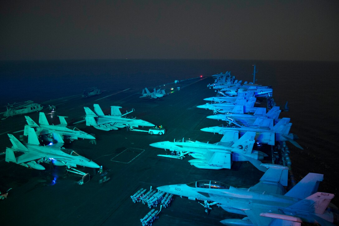 ARABIAN GULF (Oct. 19, 2016) Sailors prepare for flight operations on the flight deck of the aircraft carrier USS Dwight D. Eisenhower (CVN 69) (Ike). Ike and its Carrier Strike Group are deployed in support of Operation Inherent Resolve, maritime security operations and theater security cooperation efforts in the U.S. 5th Fleet area of operations. (U.S. Navy photo by Seaman Dartez C. Williams)