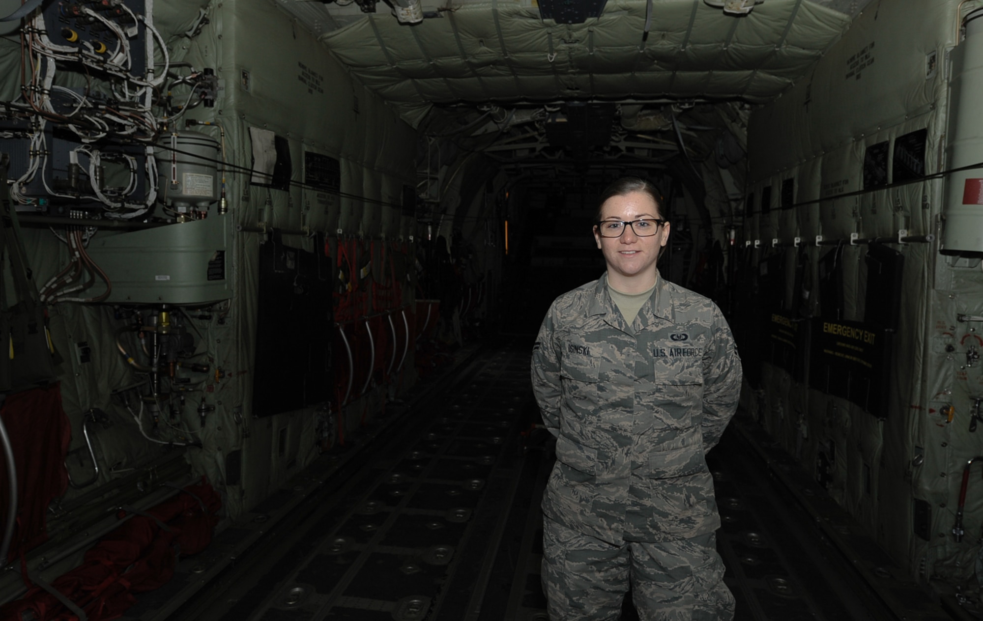 Airman 1st Class Adriya Osinski, 86th Operations Support Squadron aircrew flight equipment apprentice, poses inside of a 37th Airlift Squadron C-130 J Super Hercules aircraft at Ramstein Air Base, Germany, Nov. 4, 2016. Osinski is responsible for inspecting and prepositioning survival equipment on the aircraft, as well as inspecting and maintaining equipment such as oxygen masks, helmets and night vision goggles used for routine flying operations.
(U.S. Air Force photo by Airman 1st Class Savannah L. Waters)

