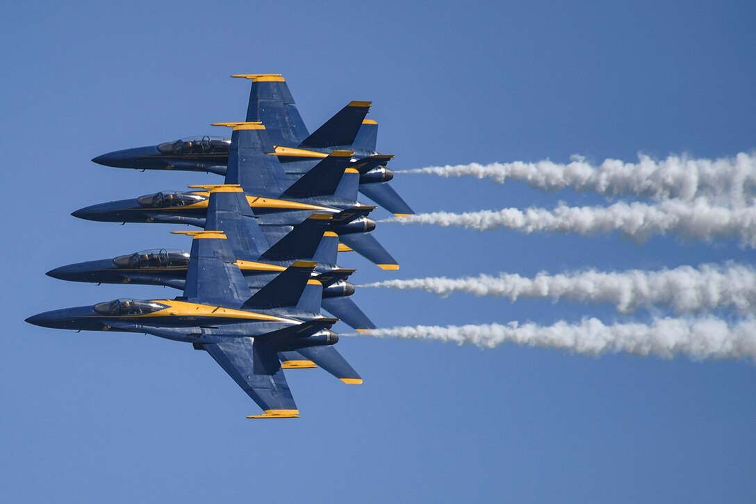 The Blue Angels, the Navy's flight demonstration squadron, fly F/A-18C Hornets during the 2016 Sea and Sky Spectacular in Jacksonville Beach, Fla., Nov. 5, 2016. Navy photo by Petty Officer 2nd Class Timothy Schumaker
