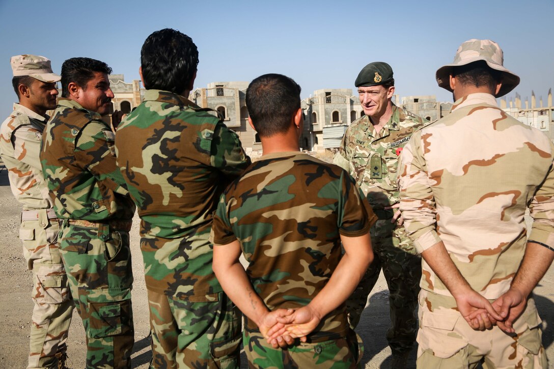 United Kingdom Maj. Gen. Rupert Jones, Deputy Commander – Strategy and Support, Combined Joint Task Force – Operation Inherent Resolve, speaks to Peshmerga soldiers during a counter improvised explosive device class near Erbil, Iraq, Nov. 7, 2016. Combined Joint Task Force – Operation Inherent Resolve’s multinational Coalition has trained more than 31,800 Iraqi security forces personnel at building partner capacity sites to defeat the Islamic State of Iraq and the Levant. (U.S. Army photo by Sgt. Lisa Soy)