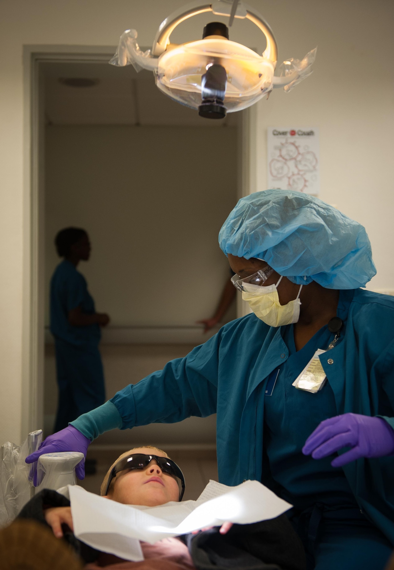 Staff Sgt. Kirsten Moss, 86th Dental Squadron oral preventative technician, prepares her patient, Channing Wray, for a dental checkup during Moss’s squadron’s “Little Teeth, Big Smile” event at Ramstein Air Base, Germany, Nov. 5, 2016. The event was a children-focused initiative to encourage parents to bring their children up to 10 years old to get their teeth checked or cleaned. According to the Center for Disease and Control, tooth decay is one of the most common chronic conditions of childhood in the United States. Untreated cavities can cause pain and infections that may lead to problems with eating, speaking, playing, and learning. (U.S. Air Force photo by Airman 1st Class Lane T. Plummer)