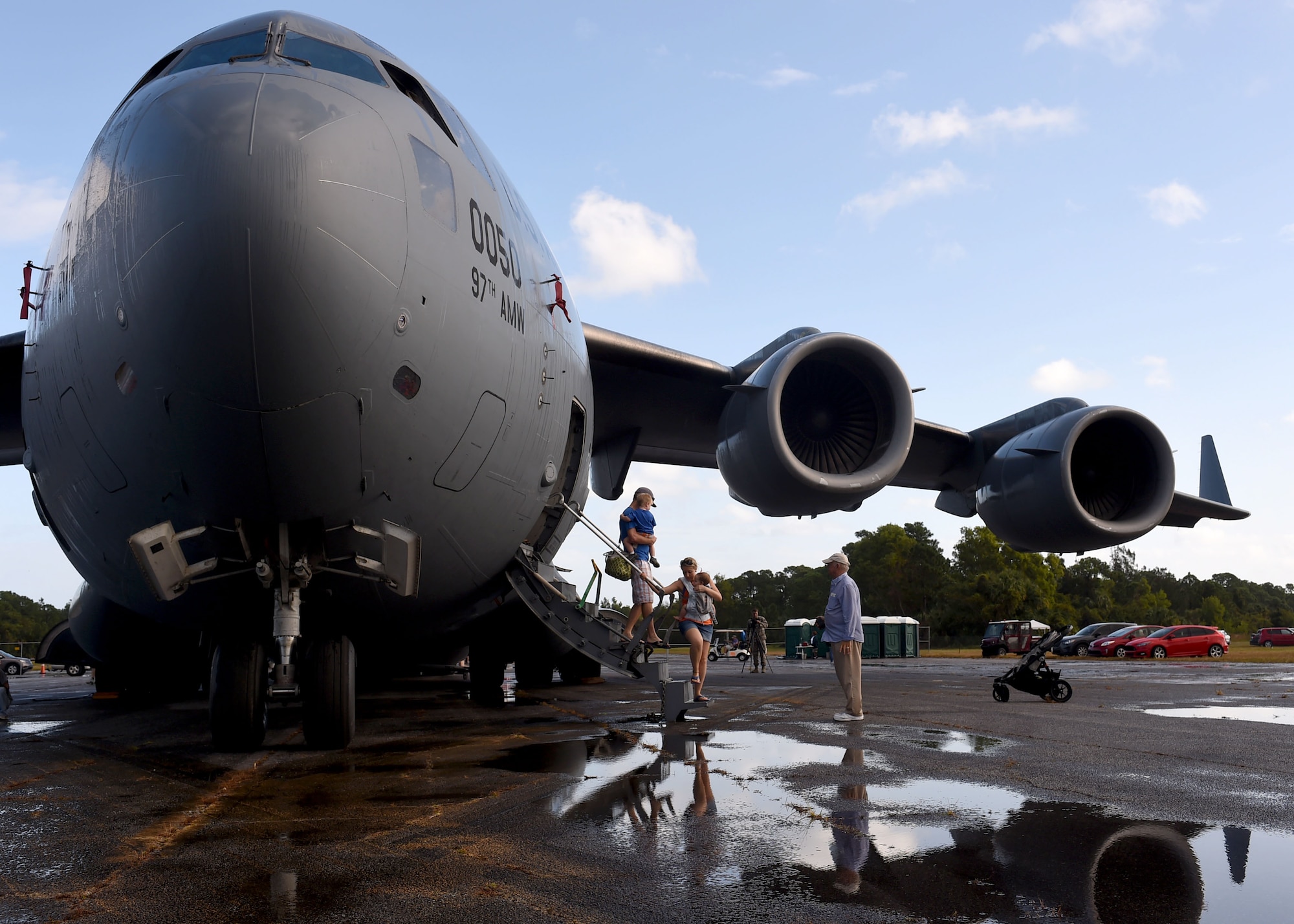 A U.S. Air Force C-17 Globemaster III cargo aircraft assigned to the 97th Air Mobility Wing, sits on a flight line during the 2016 Stuart Air Show, Nov. 4, 2016 at Stuart, Florida. The C-17 was set up as a static display during the air show to help educate attendees about its capabilities and the 97th AMW training mission. (U.S. Air Force photo by Senior Airman Franklin R. Ramos/Released)