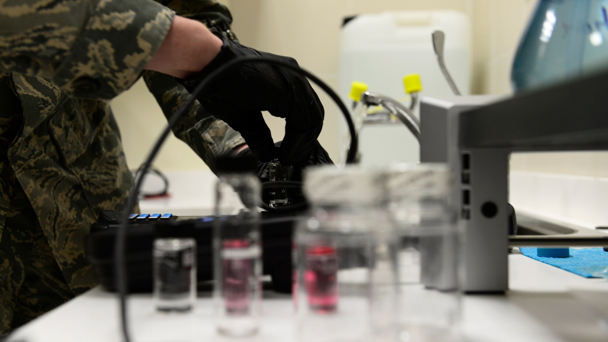 Airman 1st Class Jacob Blankenship, 31st Aerospace Medicine Squadron Bioenvironmental Engineering technician, tests water samples at Aviano Air Base, Italy on Nov. 3, 2016. Blankenship tested the water’s pH, chlorine, temperature and bacteria levels to ensure base water is safe for consumption. (U.S. Air Force photo by Senior Airman Cary Smith)