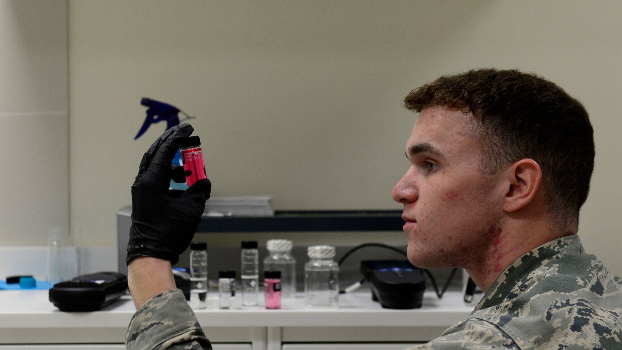 Airman 1st Class Jacob Blankenship, 31st Aerospace Medicine Squadron Bioenvironmental Engineering technician, examines a chlorine sample during a bacteriological water test at Aviano Air Base, Italy on Nov. 3, 2016.  Blankenship tested for pH, chlorine, temperature and bacteria levels to ensure base water is safe to consume. (U.S. Air Force photo by Senior Airman Cary Smith)