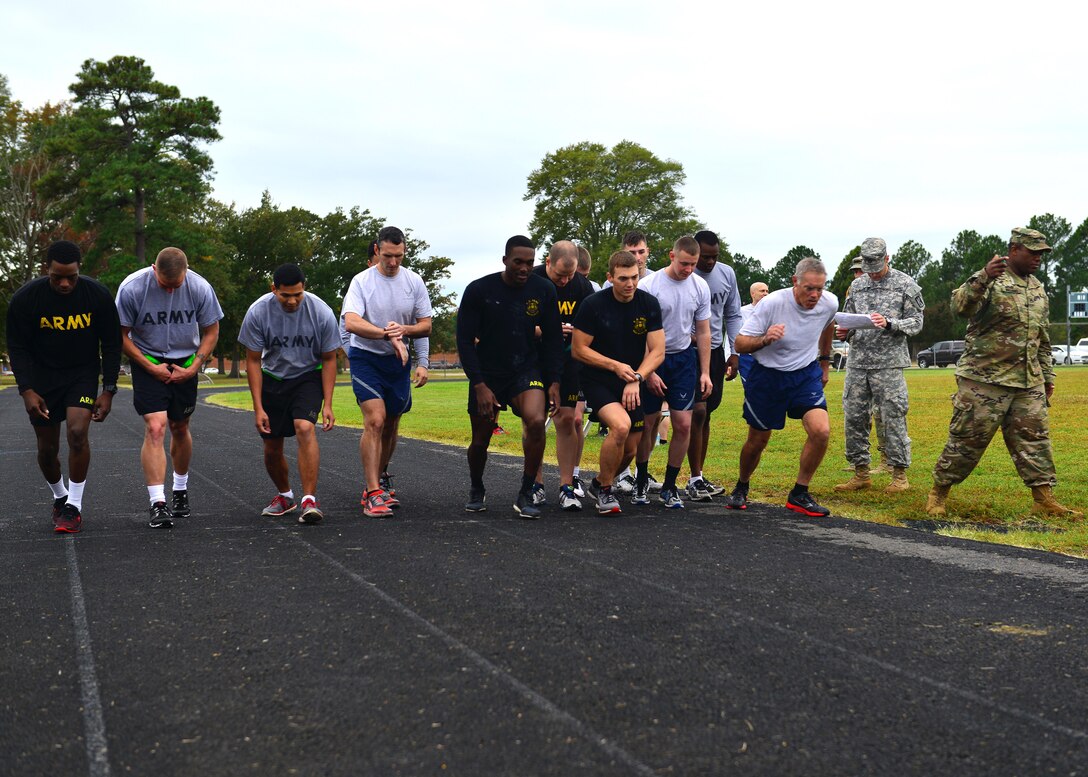 U.S. Air Force Airmen, U.S. Army Soldiers and U.S. Navy Sailors start the 1,000 meter run, two and a half laps on the track, during the German Armed Forces Badge for military Proficiency event at Joint Base Langley-Eustis, Va., Nov. 1, 2016.  The GAFPB 1,000 meter run is just one of five events and must be completed within six minutes and 30 seconds to qualify.  There is a bronze, silver and gold ranking system used to award qualifying participants.  (U.S. Air Force photo/Tech Sgt. Daylena S. Ricks)