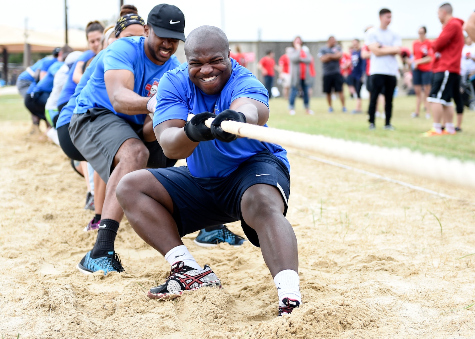 The 59th Dental Group tug-of-war team pulls with intensity during the 59th Medical Wing Warrior Medic Challenge on Joint Base San Antonio-Lackland, Texas, Nov. 4, 2016. The 59th DG won the double-elimination tug-of-war competition. (U.S. Air Force photo/Staff Sgt. Kevin Iinuma)