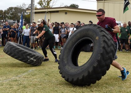 Airmen flip 150-pound tires during the 2016 Warrior Medic Challenge on Joint Base San Antonio-Lackland, Texas, Nov. 4. The “flip ya for it” relay race required each member of a group’s six-person team to flip the tire across a distance of 50 feet. (U.S. Air Force photo/Staff Sgt. Kevin Iinuma)