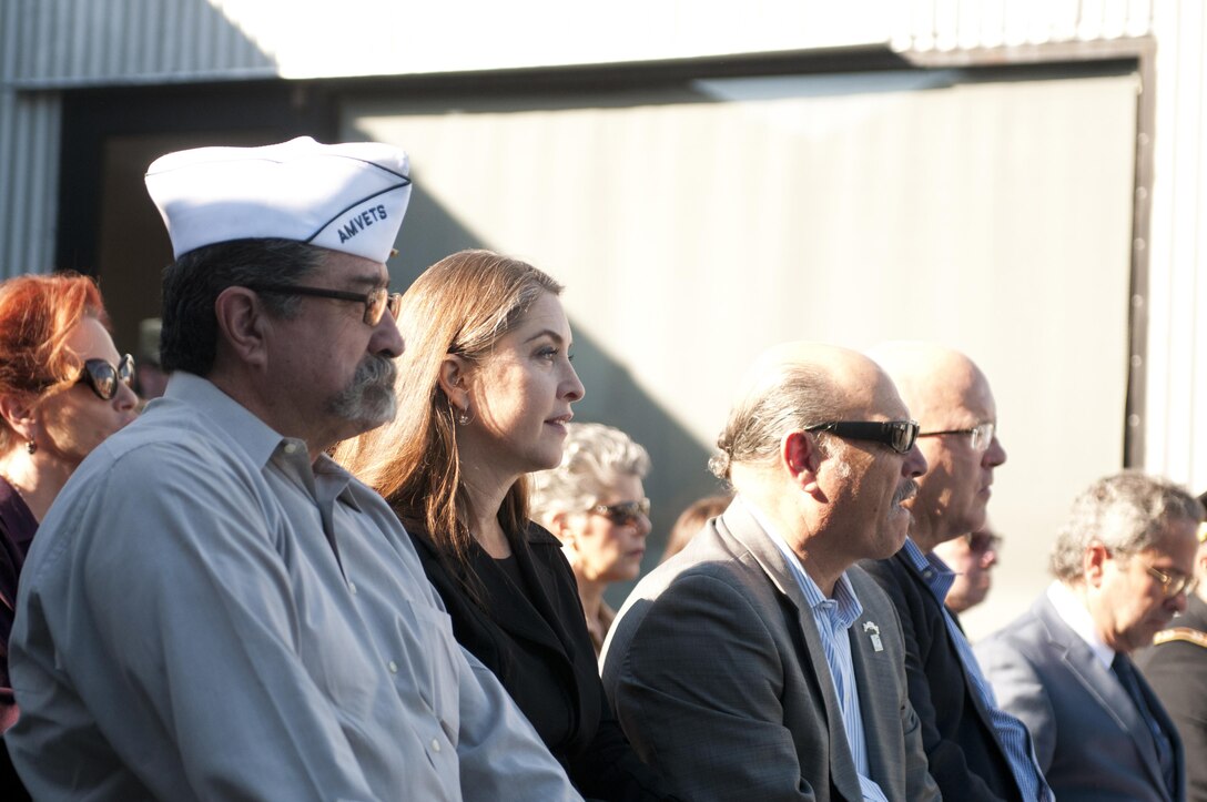 Hannah Adams, second from right, the great-niece of Pvt. Joe Gandara, and Santa Monica Mayor Tony Vazquez, third from right, look on during a dedication ceremony for Gandara Nov. 4 at the Santa Monica 26th Street/Bergamot train station. Gandara, killed in action in WWII, was awarded the Medal of Honor in 2014 as part of the Valor 24 program. (U.S. Army Photo by Sgt. 1st Class Alexandra Hays, 79th Sustainment Support Command).