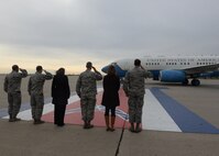 Base leadership stands with their spouses as they salute U.S. Marine Corps Gen. Joseph F. Dunford Jr., chairman of the Joint Chiefs of Staff, as he lands at Minot Air Force Base, N.D., Nov. 2, 2016. Dunford visited Airmen and spoke about the importance of maintaining a competitive advantage over our adversaries.  (U.S. Air Force photos/Airman 1st Class Jessica Weissman)