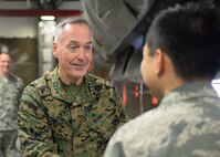 U.S. Marine Corps Gen. Joseph F. Dunford Jr., chairman of the Joint Chiefs of Staff, commends an Airman at Minot Air Force Base, N.D., Nov. 2, 2016. Dunford visited Airmen and spoke about the importance of maintaining a competitive advantage over our adversaries.  (U.S. Air Force photos/Airman 1st Class Jessica Weissman)