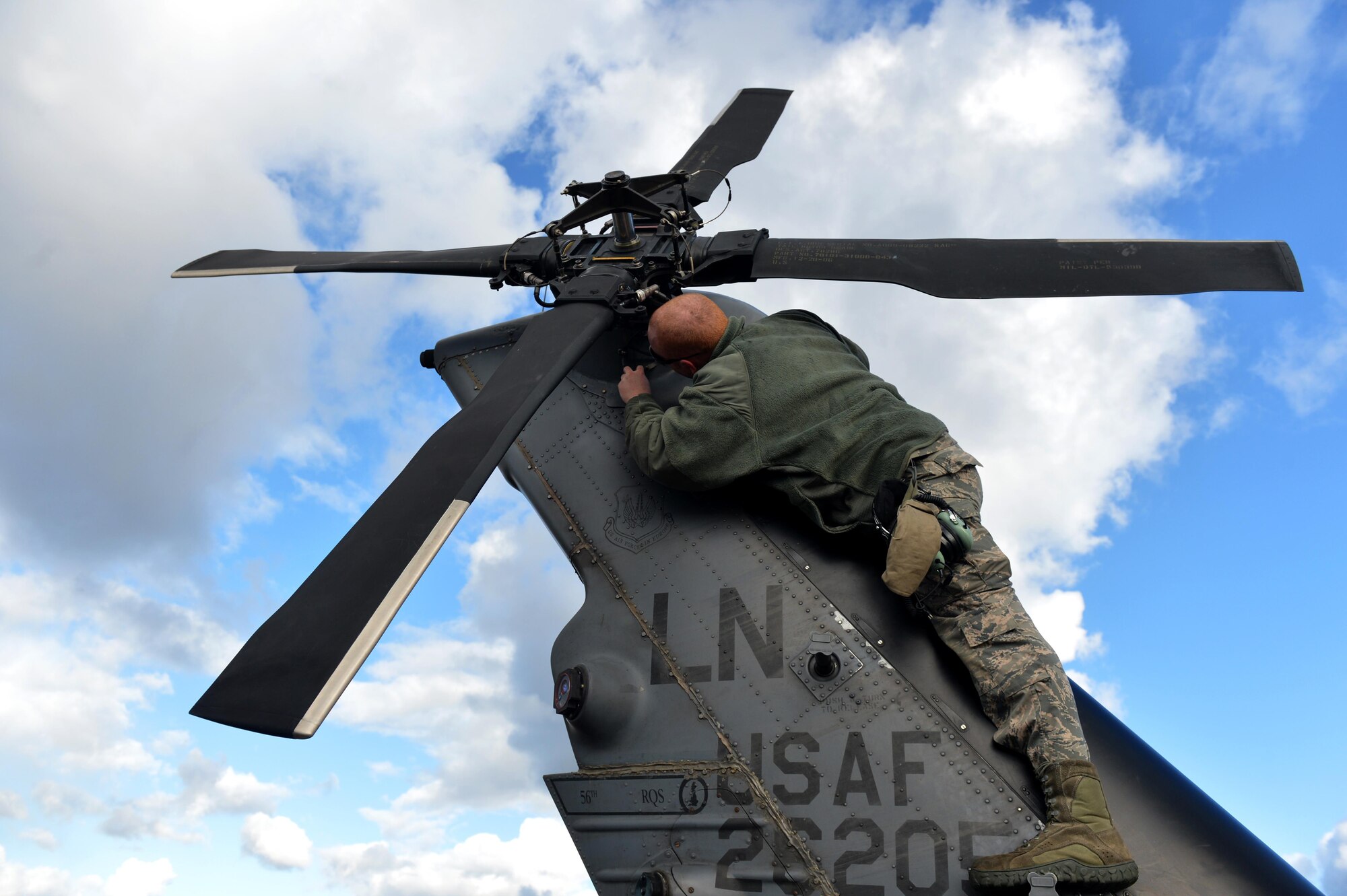 A maintenance crew chief repairs a faulty anti-icing component Nov. 7 prior to a flying mission during Exercise Salamander at Cazaux Air Force Base, France. Two HH-60G Pave Hawk helicopters assigned to the 56th RQS and approximately 100 Airmen are involved in the joint training exercise with French Air Force members and helicopters. (U.S. Air Force photo/Master Sgt. Eric Burks)