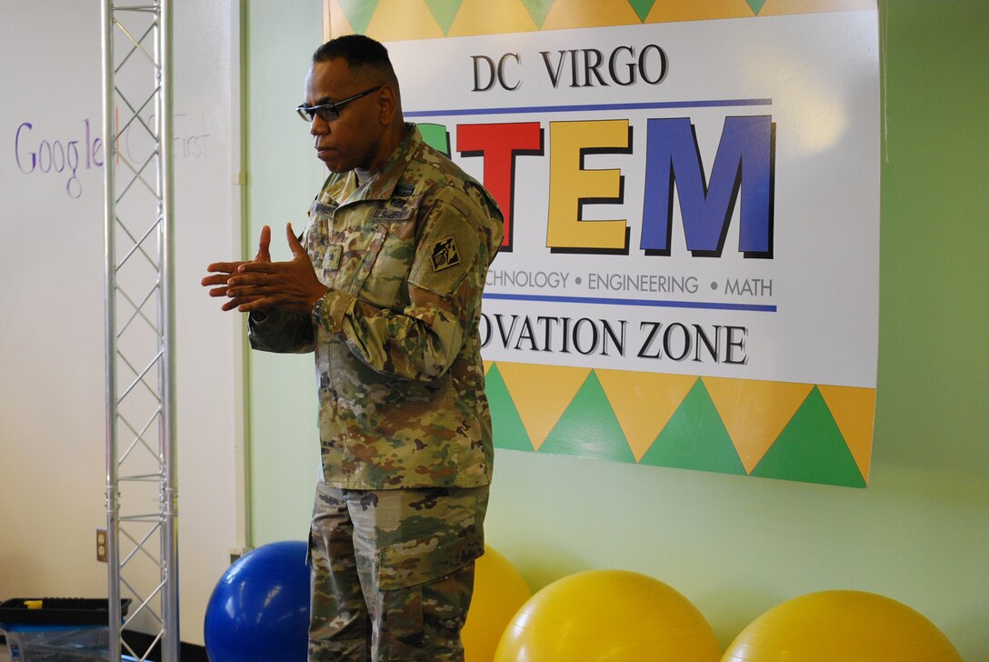 Brig. Gen. C. David Turner, U.S. Army Corps of Engineers South Atlantic Division commander, speaks to middle school students at D.C. Virgo Preparatory Academy in New Hanover County, North Carolina on Nov. 3, 2016. As part of his active STEM outreach initiative, Turner discussed careers in engineering and history of the Army's contributions to the nation's engineering capabilities.