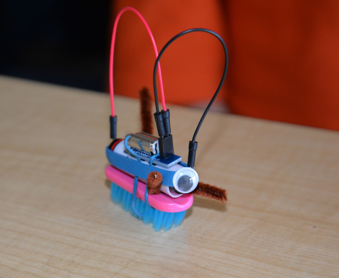 A completed Bristlebot assembled by a student at a science, technology, engineering and math (STEM) event on Oct. 31, 2016, at Naval Surface Warfare Center, Carderock Division in West Bethesda, Md. The students, from Lucy V. Barnsley Elementary School in Montgomery County, Md., learned to assemble the robots, which incorporate a small brush, a battery and a very small motor to create an electrical circuit allowing the Bristlebot to "walk" using vibrations. U.S. Navy photo by Daniel Daglis (Released) 