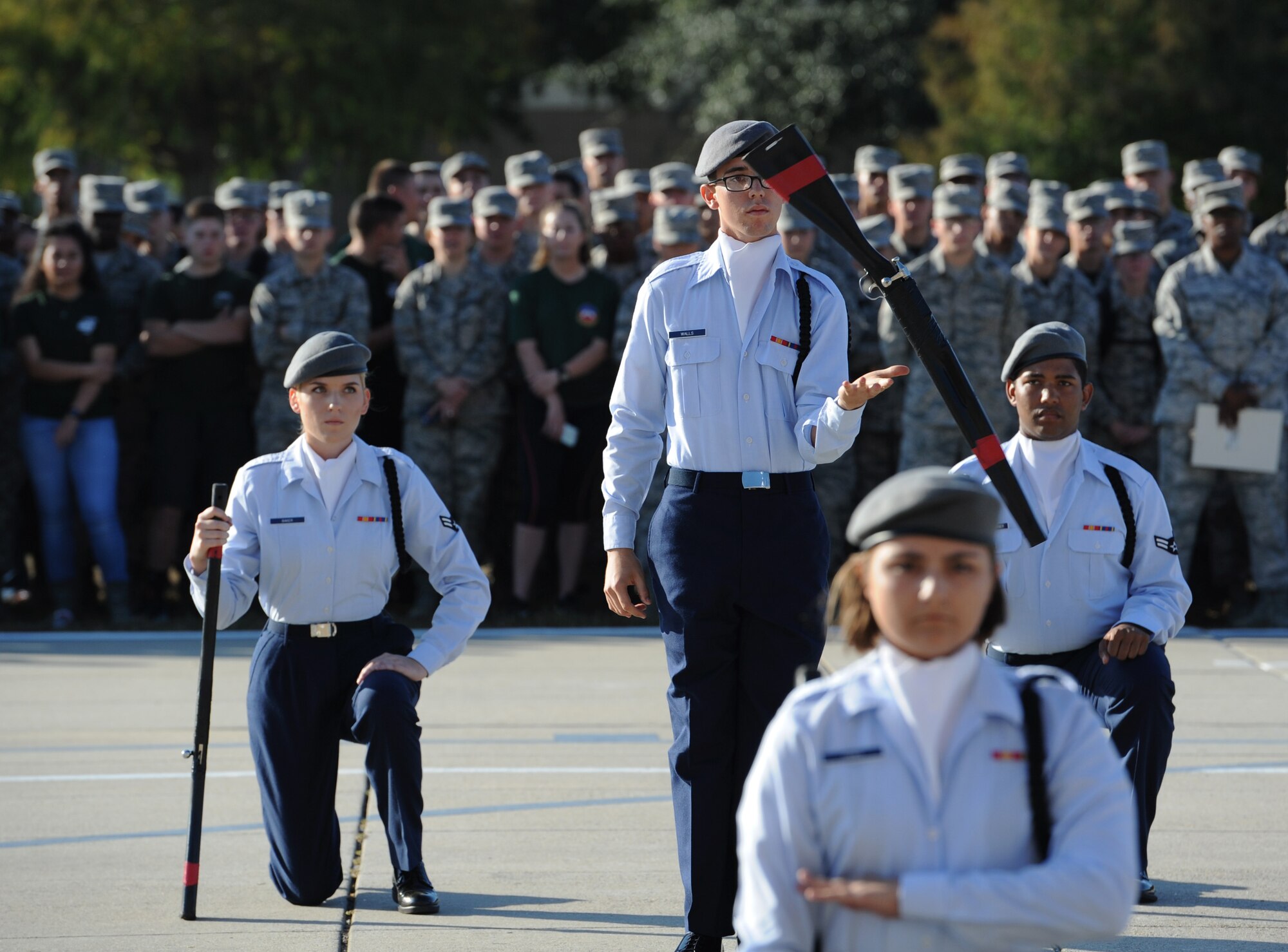 Airman Basic Joel Walls, 335th Training Squadron regulation drill team member, spins a rifle during the 81st Training Group drill down at the Levitow Training Support Facility drill pad Nov. 4, 2016, on Keesler Air Force Base, Miss. The quarterly drill down featured an open ranks inspection, regulation drill routine and freestyle drill routine categories. The 81st TRG’s four non-prior service training squadrons competed in the competition, with the 334th TRS “Gators” taking home the overall first place. (U.S. Air Force photo by Kemberly Groue/Released)