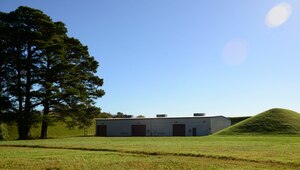 Hills surround buildings holding ammunition in ‘ammo country’ at Joint Base Langley-Eustis, Va., Oct. 21, 2016. The large mounds lighten the impact of the surrounding area in case of an inadvertent explosion of the stored munitions. (U.S. Air Force photo by Airman 1st Class Kaylee Dubois)