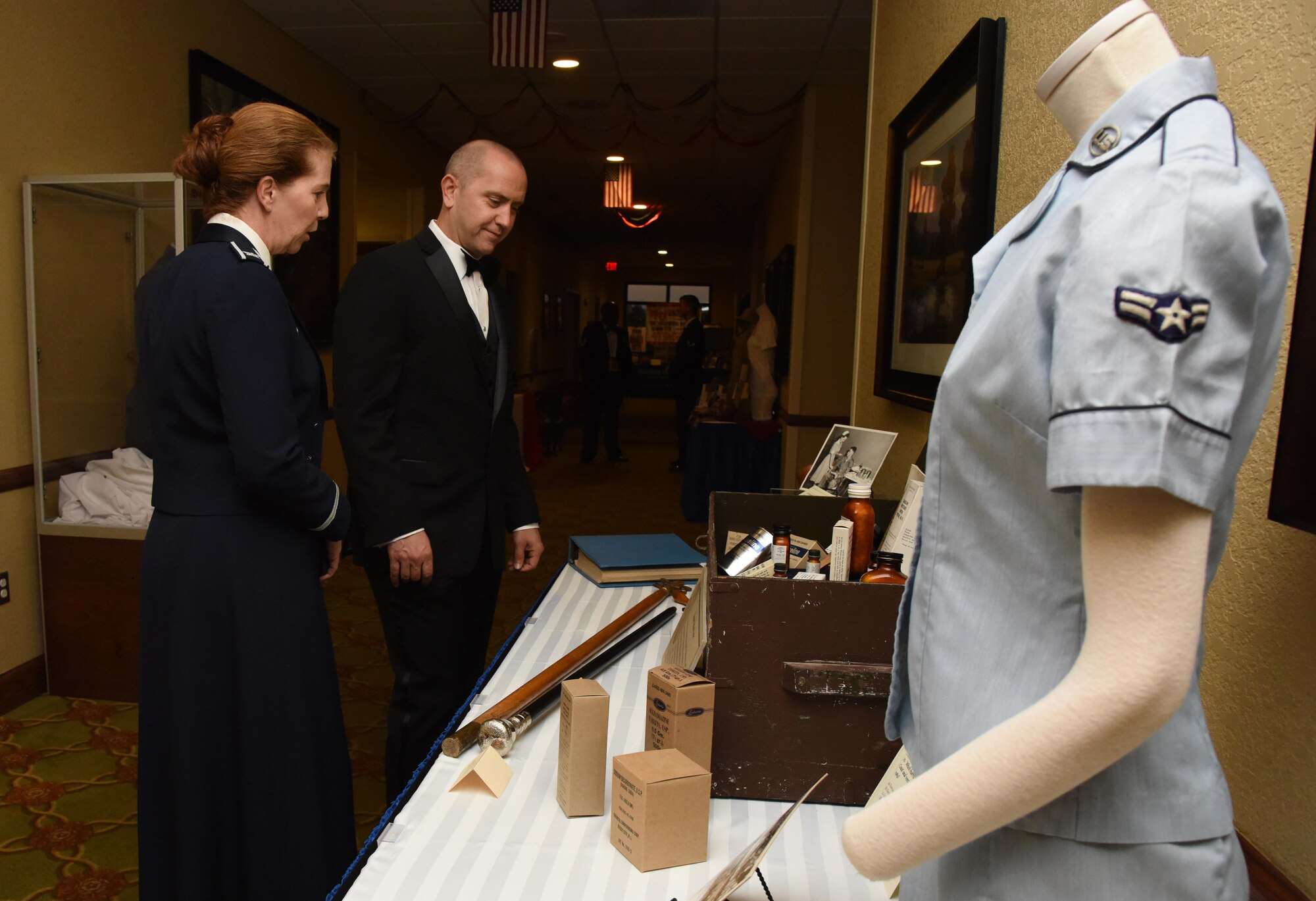 Col. Maureen Harback, 81st Diagnostic and Therapeutics Squadron commander, and her husband, Greg, view historical displays at the Bay Breeze Event Center during the installation’s 75th Anniversary Gala Nov. 4, 2016, on Keesler Air Force Base, Miss. The celebration commemorated Keesler’s 75 years of history with historical displays, throwback trivia, musical and dance performances and recognition of family members of Lt. Samuel Keesler, Jr. (U.S. Air Force photo by Kemberly Groue/Released)