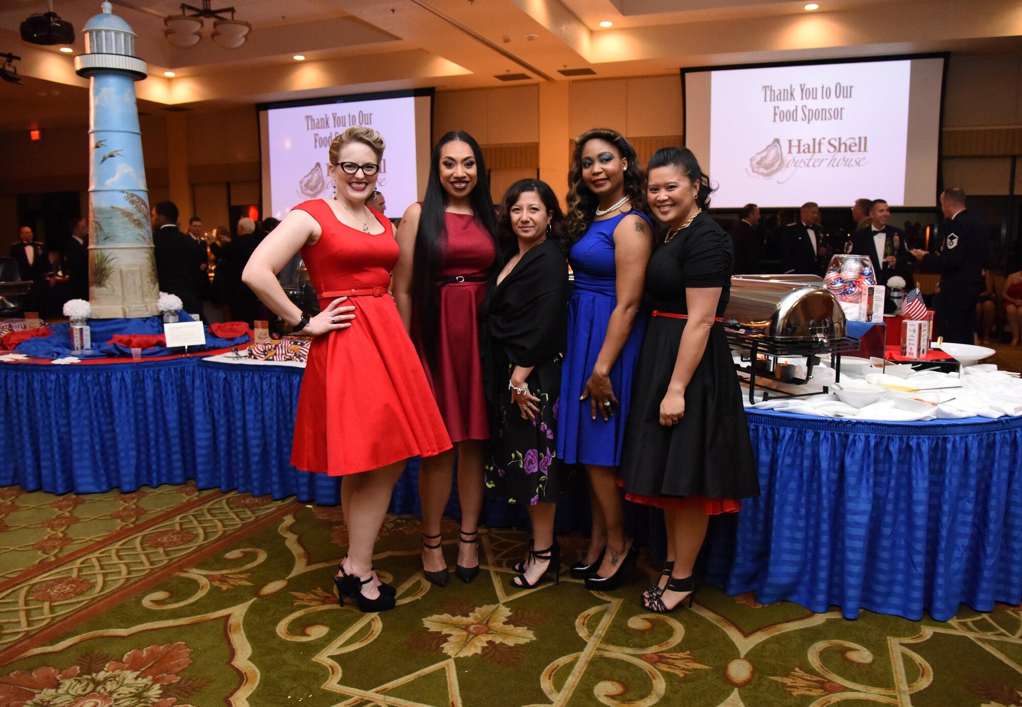 Keesler personnel pose for a photo wearing 1940s-1950s attire during the installation’s 75th Anniversary Gala at the Bay Breeze Event Center Nov. 4, 2016, on Keesler Air Force Base, Miss. The celebration commemorated Keesler’s 75 years of history with historical displays, throwback trivia, musical and dance performances and recognition of family members of Lt. Samuel Keesler, Jr. (U.S. Air Force photo by Kemberly Groue/Released)