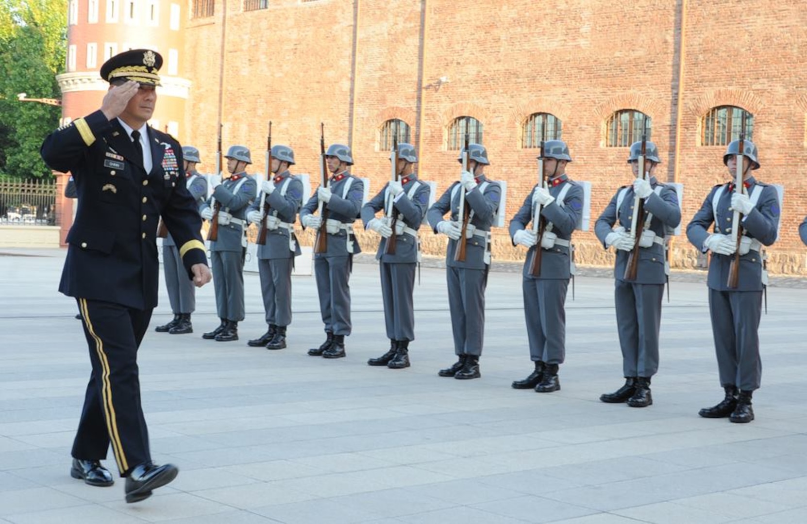 Maj. Gen. K.K. Chinn (left) salutes Chilean troops in formation Oct. 28 as part of U.S. and Chilean Army to Army Executive Staff Talks held in Santiago, Chile. 