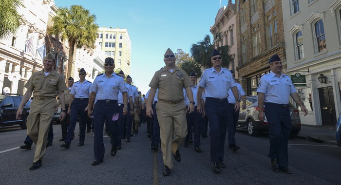 Members of Joint Base Charleston march together during the Veterans Day parade in Charleston, South Carolina, Oct. 6, 2016. The parade is held to honor Veterans Day which became a national holiday Nov. 11, 1938. Veterans Day pays tribute to all American veterans, alive or deceased. 