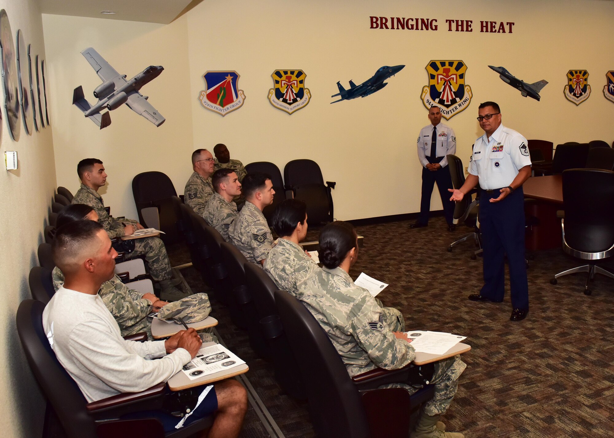 Master Sgt. Carlos Recoder, 433rd Training Recruiters military training instructor supervisor, talks with 944th Fighter Wing Airmen about becoming MTIs Nov. 5 at Luke Air Force Base, Ariz. 