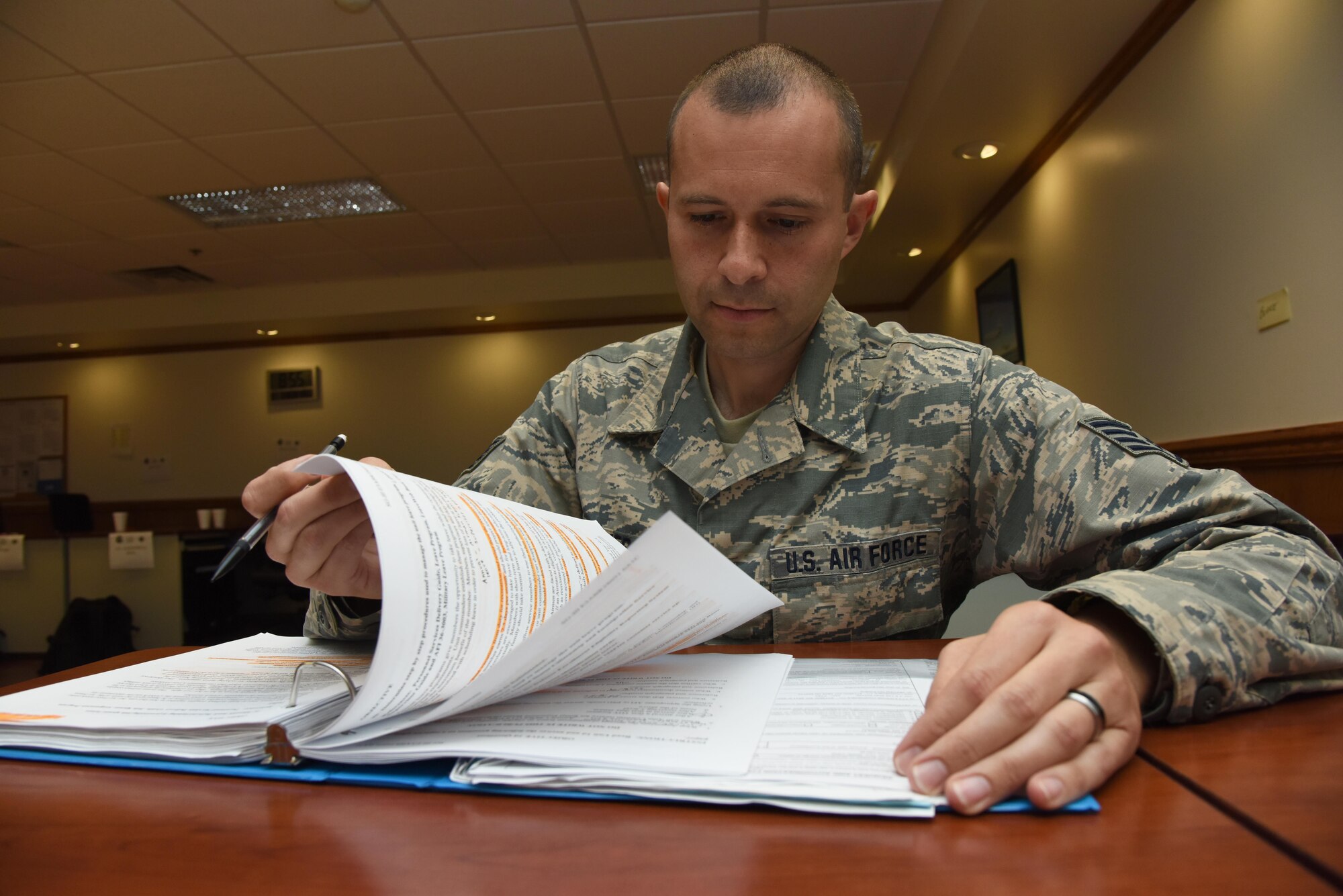 Staff Sgt. Garrett Klever, 335th Training Squadron student, reviews personnel apprentice course study material at Wolfe Hall Nov. 8, 2016, on Keesler Air Force Base, Miss. Klever graduated with perfect scores throughout the course. After graduation he will return to the 142nd Force Support Squadron, Portland Air National Guard Base, Ore. (U.S. Air Force photo by Kemberly Groue/Released)