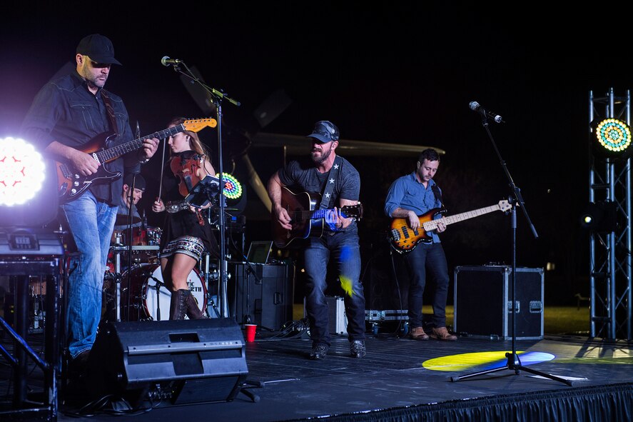Kyle Jennings, a country music singer, performs with his band, Nov. 8, 2016, at Moody Air Force Base, Ga. Jennings closed out Moody Fest with a family friendly concert. (U.S. Air Force photo by Airman 1st Class Janiqua P. Robinson)