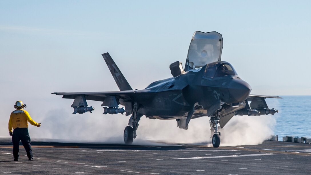 An F-35B Lightning II short takeoff/vertical landing aircraft conducts test operations on the flight deck of amphibious assault ship USS America. The highly diverse cadre of Pax River Integrated Test Force  technicians, maintainers, engineers, logisticians, support staff and test pilots are embarked for the third and final developmental test phase of F-35B carrier suitability and integration.