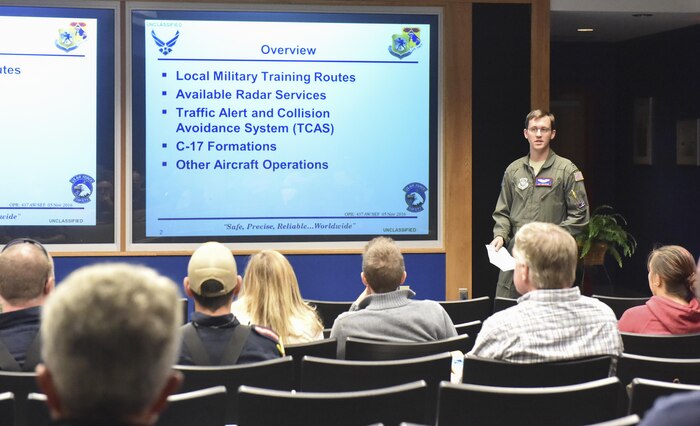 U.S. Air Force Capt. Jeffrey Riesterer, a pilot from the 15 Airlift Squadron, briefs local civilian pilots during Joint Base Charleston’s first Mid-air Collision Avoidance event Nov. 5, 2016. The MACA program is designed to promote aviation safety between military and civilian pilots who share the local airspace. Sharing the mission of JB Charleston with community civilian pilots offers a better understanding of why specific procedures are put in place. The event gives pilots, military and civilian, a forum to discuss flying and aviation safety.