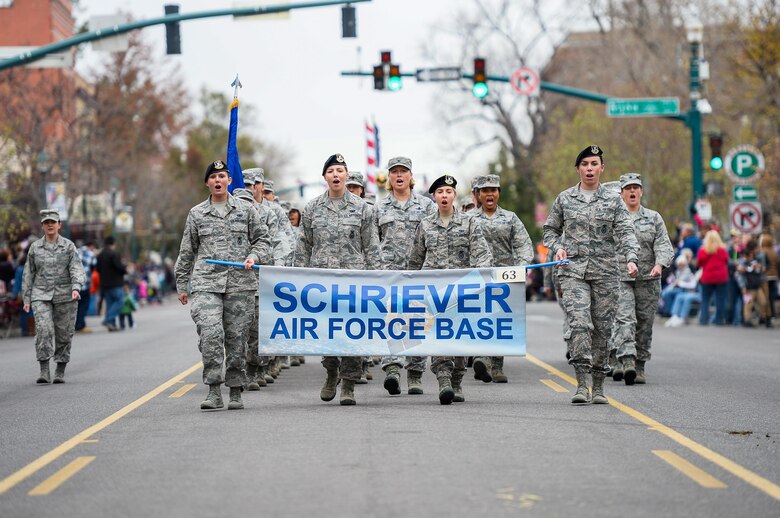 Col. DeAnna Burt, 50th Space Wing commander, leads Airmen during the Colorado Springs Veteran’s Day Parade in Colorado Springs, Colorado, Saturday, Nov. 5, 2016. Burt and the all-female Airmen flight represented Schriever during the women in military themed parade. (U.S. Air Force photo/Christopher DeWitt)