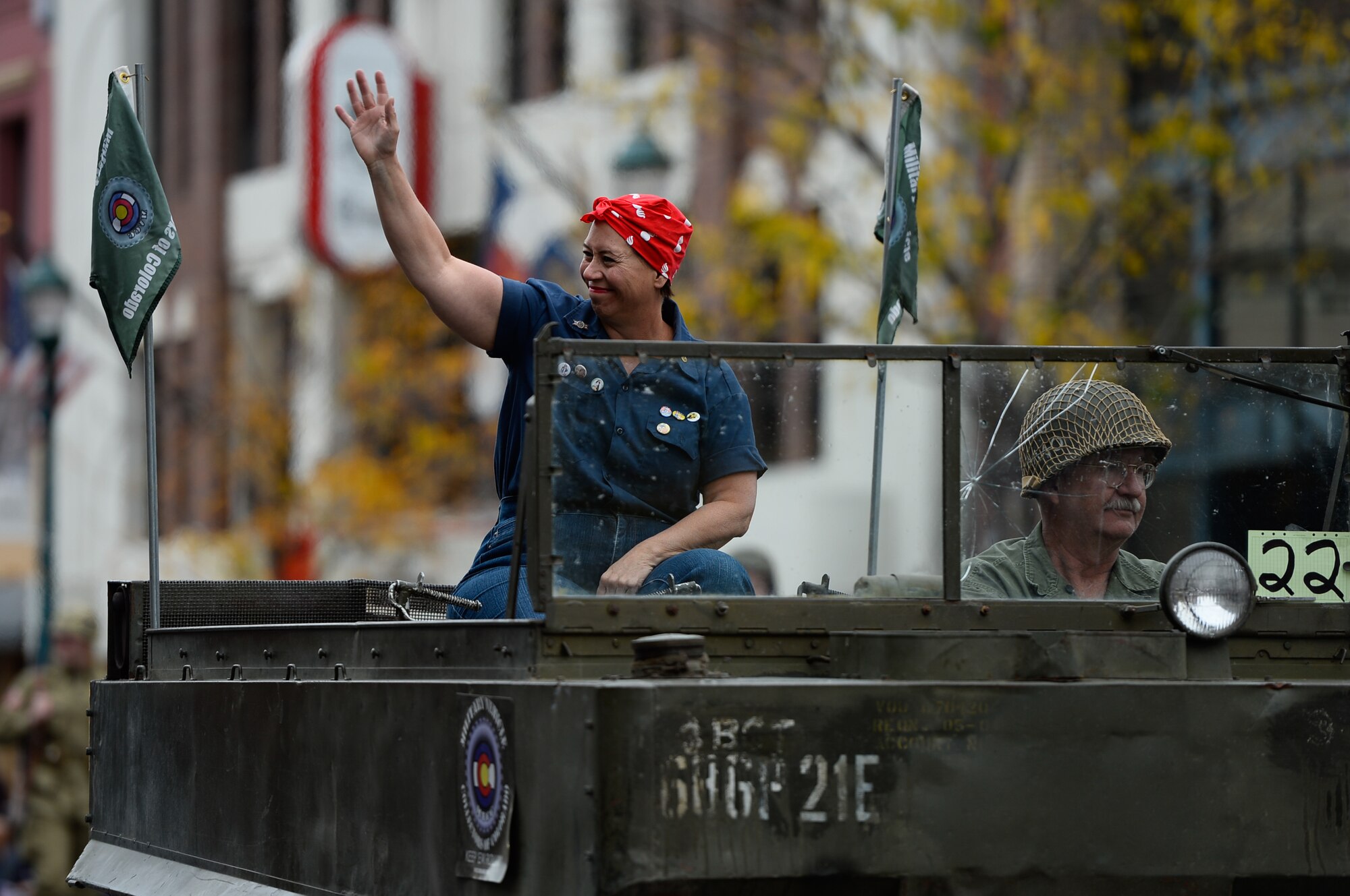 “Rosie the Riveter” waves to the crowd during the Colorado Springs Veteran’s Day Parade in Colorado Springs, Colorado, Saturday, Nov. 5, 2016. The iconic image was used during World War II to encourage women to support the war effort back home. (U.S. Air Force photo/Christopher DeWitt)