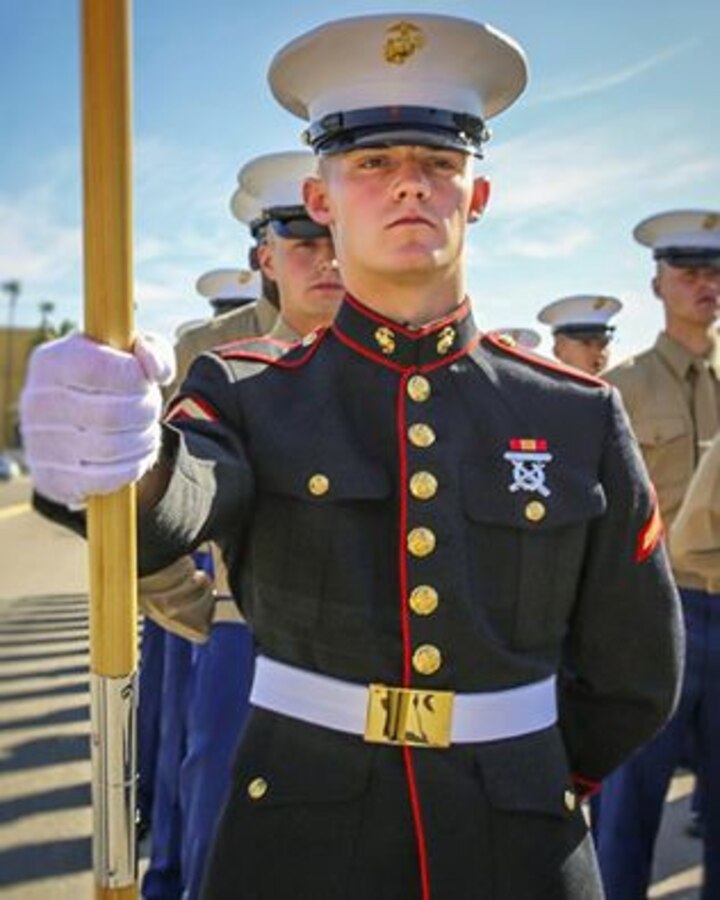 Before Lance Cpl. Tristan Downing from Spokane, WA began serving as a Marine Corps cyber network operator in North Carolina, he graduated as the top Marine, aka "guide," of his platoon on MCRD San Diego. Give him one! (U.S. Marine Corps photo by Cpl. Angelica Annastas)