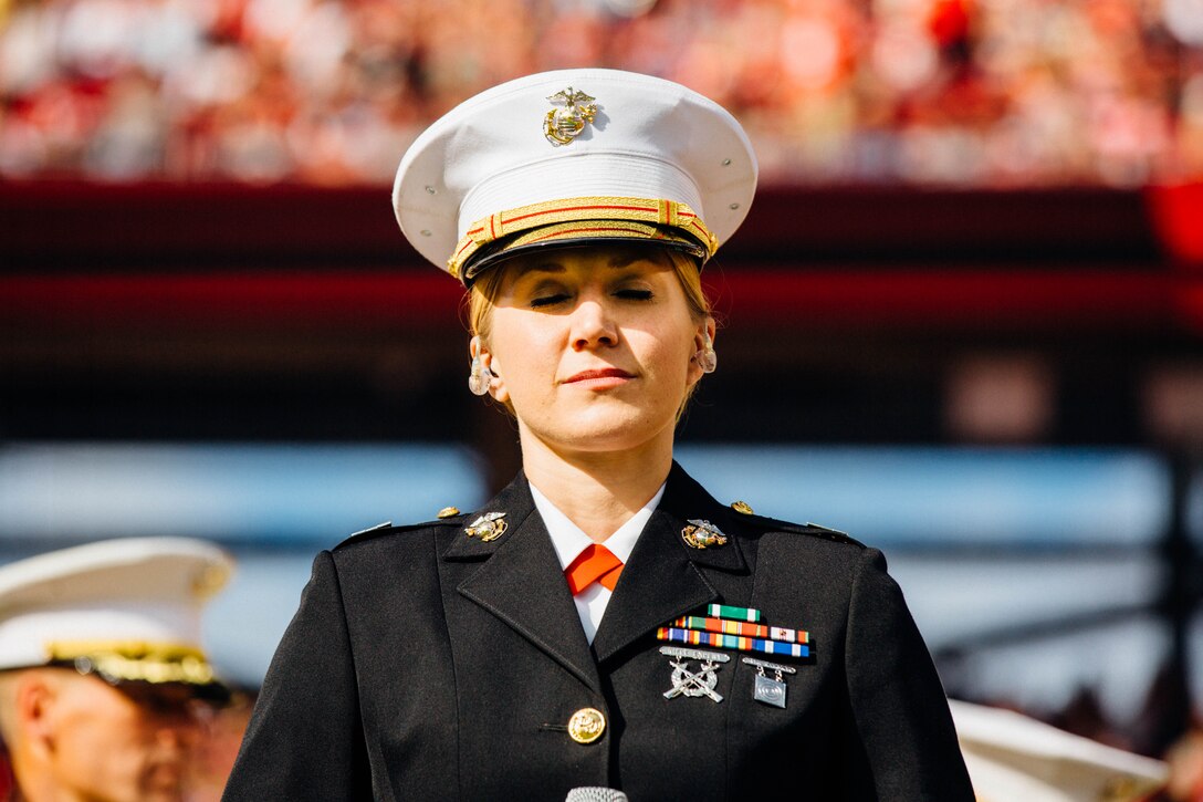 Captain Skye Martin, public affairs officer for 12th Marine Corps Recruiting District, takes a deep breath before singing the national anthem during the opening ceremony of the San Francisco 49ers’ game against the New Orleans Saints at Levi’s Stadium, Nov. 6, 2016.  The Centennial of Marine Forces Reserve was recognized as part of the National Football League’s “Salute to Service” campaign.  Today, approximately 500 Reserve Marines are providing fully integrated operational support to Fleet and Combatant Commanders around the world.  For more information on the history and heritage of Marine Forces Reserve as well as current Marine stories and upcoming Centennial events, please visit www.marines.mil/usmcr100. (U.S. Marine Corps photo by Lance Cpl. Dallas Johnson)