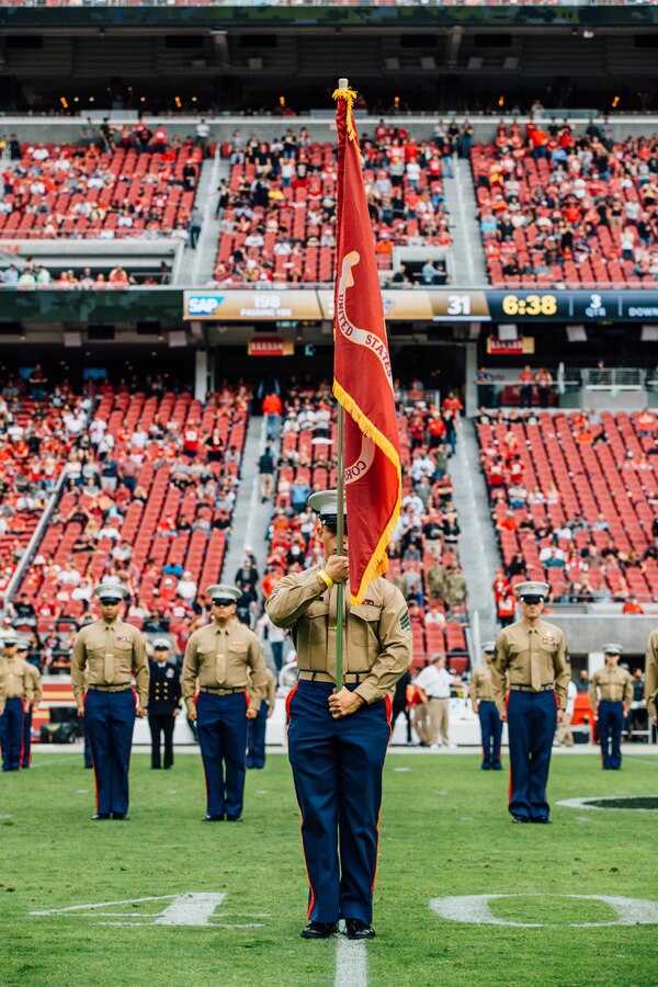 Service members from the San Francisco Bay Area stand at attention during the Marines Hymn, performed by the 1st Marine Division Band at half-time of the San Francisco 49ers’ game against the New Orleans Saints at Levi’s Stadium, Nov. 6, 2016.  The Centennial of Marine Forces Reserve was recognized as part of the National Football League’s “Salute to Service” campaign.  Today, approximately 500 Reserve Marines are providing fully integrated operational support to Fleet and Combatant Commanders around the world.  For more information on the history and heritage of Marine Forces Reserve as well as current Marine stories and upcoming Centennial events, please visit www.marines.mil/usmcr100. (U.S. Marine Corps photo by Lance Cpl. Dallas Johnson)