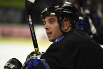 Tech. Sgt. Kyle Goeske, a Fairchild Falcons hockey player, watches from the bench at the Spokane Arena, Nov. 5, 2016, Spokane, Wash. Since 2013 when the Falcons where formed, they have grown by bringing in members from the base and community. (U.S. Air Force photo/Airman 1st Class Sean Campbell)