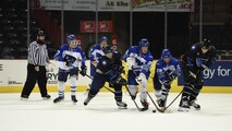 Members of the Fairchild Falcons hockey team fight for the puck during a scrimmage game at the Spokane Arena Nov. 5, 2016, Spokane, Wash. The game consisted of three 16 minute periods and a three-minute overtime. (U.S. Air Force photo/Airman 1st Class Sean Campbell)