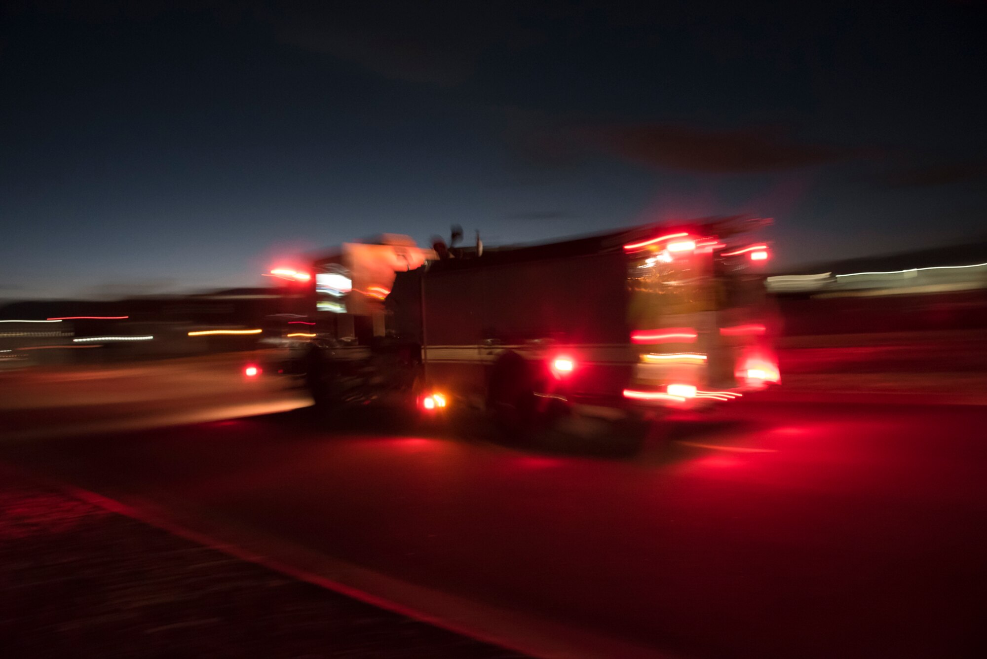 PETERSON AIR FORCE BASE, Colo. – A fire engine assigned to the Peterson Air Force Base Fire Department speeds to the scene of a simulated accident during Condor Crest at Peterson AFB, Colo., Nov. 2, 2016. Firemen at Peterson AFB work 24-hour shifts and respond to calls at any part of the day. (U.S. Air Force photo by Airman 1st Class Dennis Hoffman)