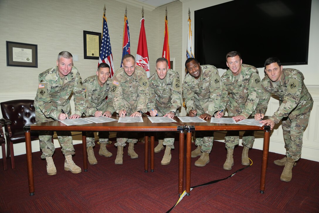 Maj. Gen. Wehr pulled his commanders and senior leaders together for the regional summit meeting (R5) in Vicksburg in November to foster ways to work more effectively as a regional team to solve difficult challenges. The leaders developed a list of focus areas for FY 17 which include the following: Strengthen the Foundation (Doing the routine things to an exceptionally high standard, routinely.)
Deliver the Program (The most strategic thing we can do is deliver our mission…keep our promises.)
Achieve our Vision (Leading ourselves into an unknowable future…together.  Our compelling, better tomorrow.)
Pictured left to right are: Col. Mike Clancy, Col. Mike Derosier, Col. Mike Ellicott, Maj. Gen. Mike Wehr, Col. Anthony Mitchell, Col. Craig Baumgartner and Col. Sam. Calkins signing the FY17 Regional Focus poster. 


