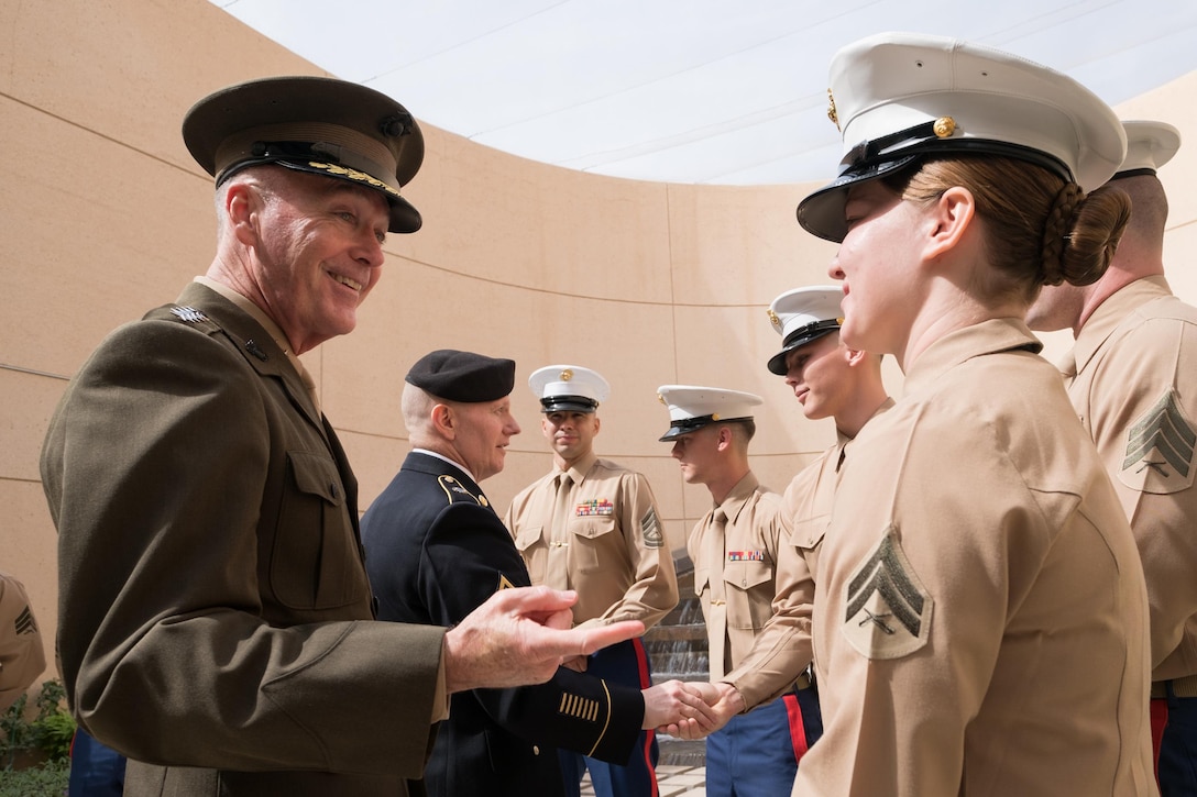 Marine Corps Gen. Joe Dunford, chairman of the Joint Chiefs of Staff, talks with Marine Corps security guards at the U.S. Embassy in Riyadh, Saudi Arabia, Nov. 8, 2016. DoD photo by D. Myles Cullen