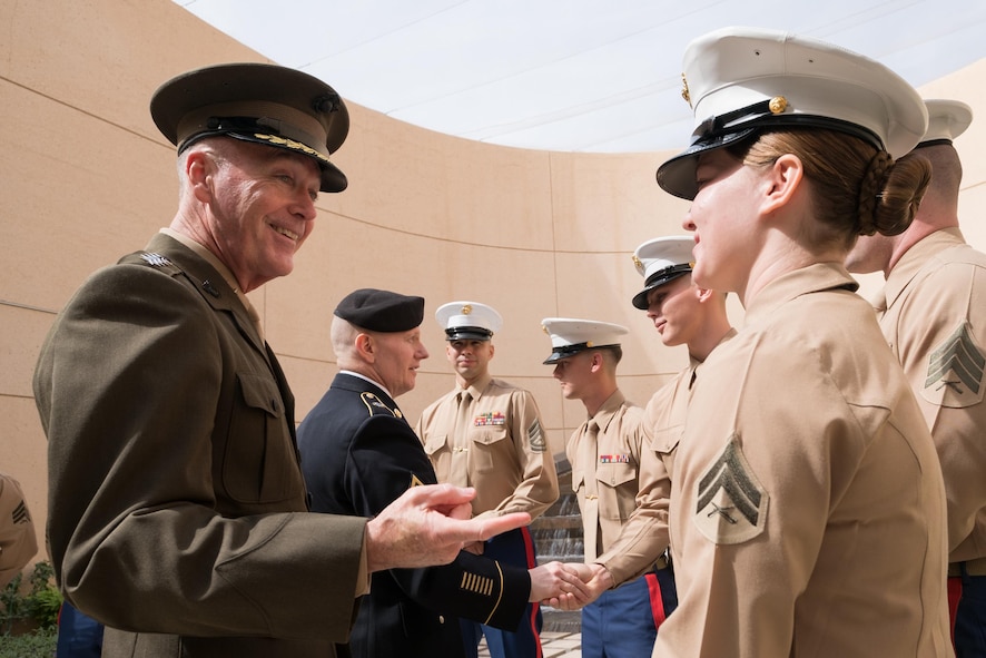 Marine Corps Gen. Joe Dunford, chairman of the Joint Chiefs of Staff, talks with Marine Corps security guards at the U.S. Embassy in Riyadh, Saudi Arabia.