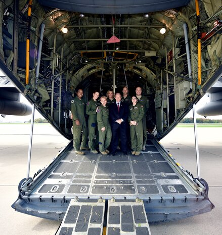 Members of the 142d Aeromedical Evacuation Squadron and the 166th Operations Group take a photo with Chris Coons, United States Senator for Delaware held on Oct. 20, 2016. (U.S. Air National Guard photo by Staff Sgt. John Michaels)