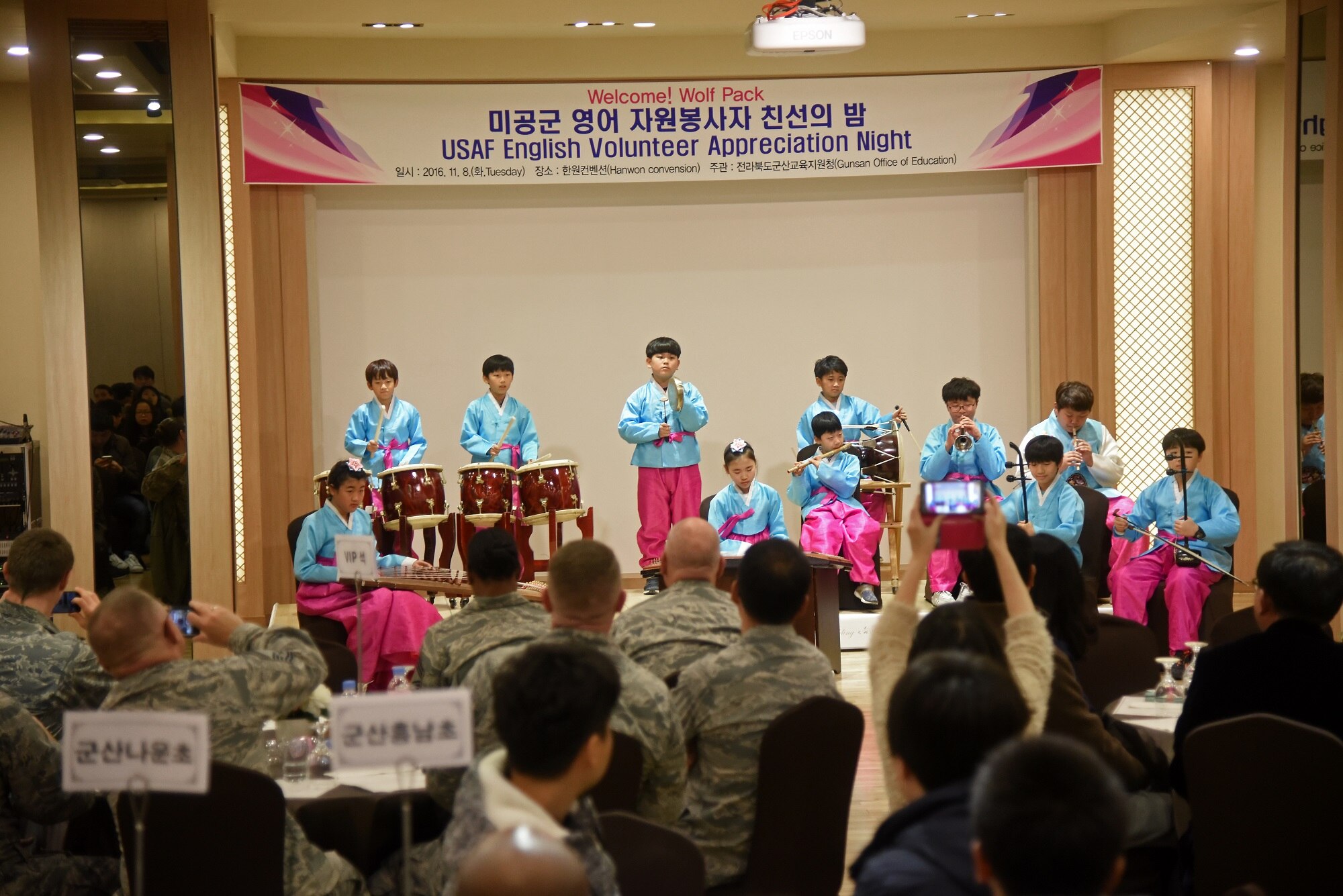 Students from Dangbook Elementary School perform during a volunteer appreciation night at the Hanwon Convention room in the city of Gunsan, Republic of Korea, Nov. 8, 2016. The students participated in an English language program taught by 8th Fighter Wing airmen. (U.S. Air Force photo by Tech. Sgt. Jeff Andrejcik/Released)